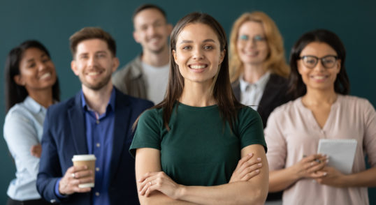happy businesswoman hands crossed posture